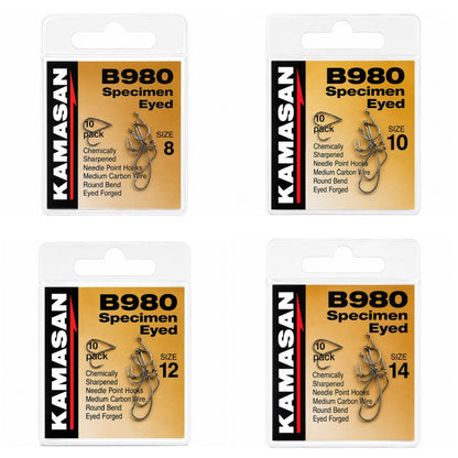 Four packages of Kamasan B980 Specimen Eyed fishing hooks in different sizes.