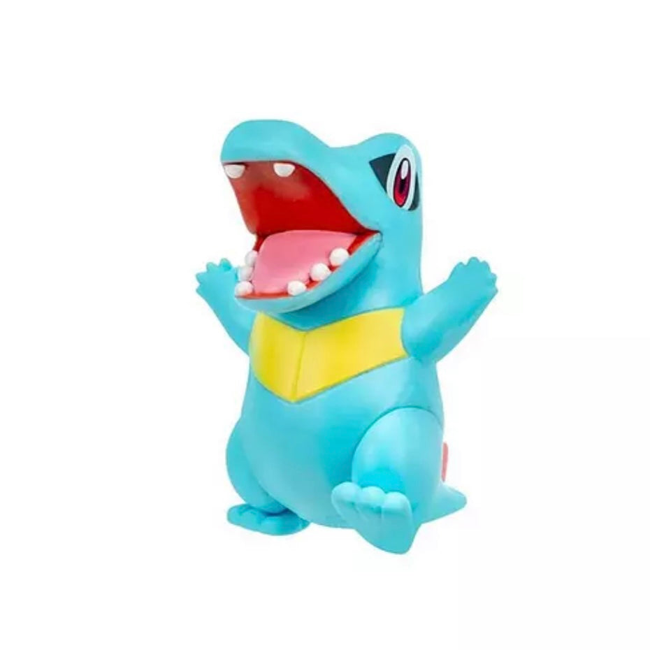 A blue and yellow Squirtle toy figure with its mouth wide open, shown against a plain white background.