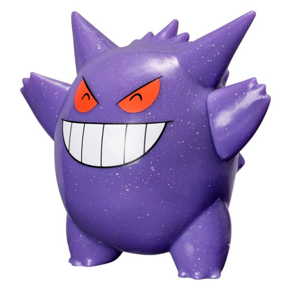 A purple Gengar collectible figure with orange eyes, white teeth, and a starry texture, isolated on a white background.