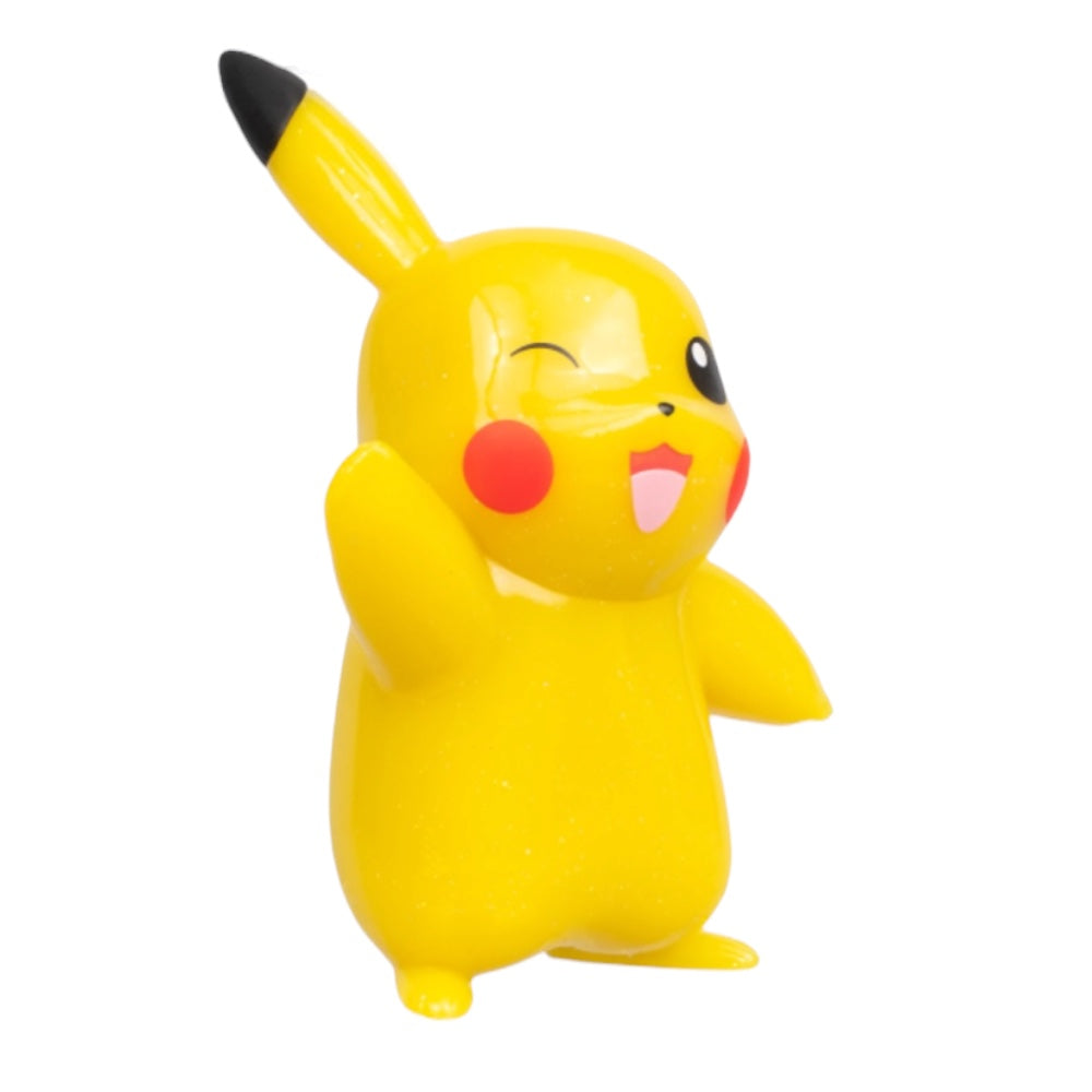 A yellow Pikachu figurine with a winking expression, standing on a plain white background.