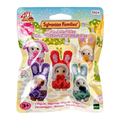 Sylvanian Families collectible figure package containing five colorful bunny costume babies in pink, red, purple, yellow, and green, on a illustrated backing card.