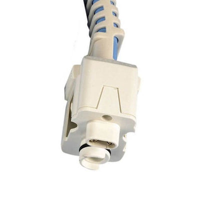 A close-up of a white plastic electrical connector on a cable with blue and black wires, isolated on a white background.