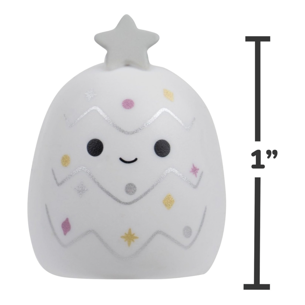 A white Christmas tree squishy toy with a cute face and colorful glittery ornaments, shown with a black height measurement indicator on the right side labeled 1 inch.