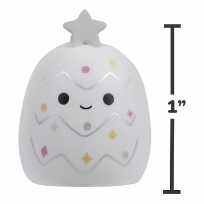 A white Christmas tree squishy toy with a cute face and colorful glittery ornaments, shown with a black height measurement indicator on the right side labeled 1 inch.