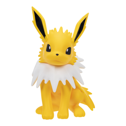 A yellow and white Eevee toy figurine with black-tipped ears, sitting against a plain white background.