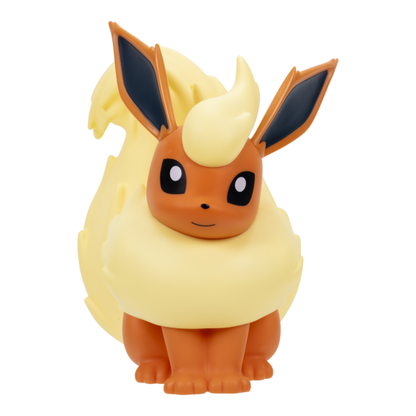 A small collectible figurine of Eevee, the iconic Pokémon character, shown against a plain white background. The figure features a warm orange-brown body, a large cream-yellow fluffy body, and dark navy blue inner ears.